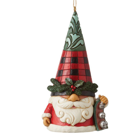 Jim Shore Gnome ornament with red and black plaid hat holding a jingle bell strap 