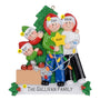 Personalized Family of Four Ornament depicting family decorating the Christmas tree with lights, ornaments, and a star