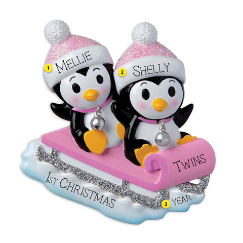 Pink Twin Penguins Sledding Ornament