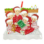 Family Ornament for Family of Six with four kids reading in bed in pajamas 