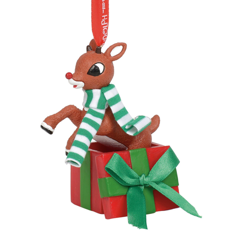 Rudolph leaping out of a Christmas present ornament