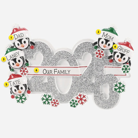 Decorative Christmas ornament with penguin family members and '2025 Our Family' text on a white background.