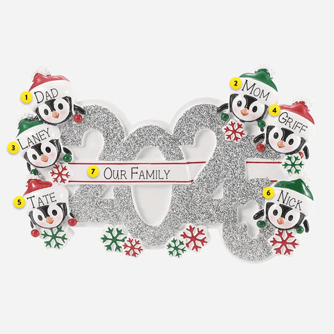Decorative ornament with 5 penguin family members and can be personalized on a white background