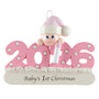 Decorative ornament with '2026' and baby figurine, featuring 'Baby's 1st Christmas' text.