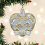 Decorative Christmas ornament with gold and white design and '2026' on a blurred Christmas tree background.