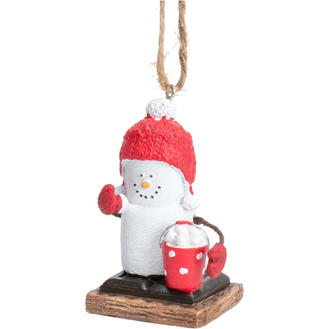 S'mores with Snowballs Ornament featuring a white s'mores character wearing a red winter hat and mittens beside a red cup filled with snowballs.
