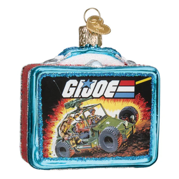 G.I. Joe-themed Christmas ornament with vehicle and characters on a white background