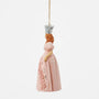 Side view of licensed Wizard of Oz Jim Shore Glinda ornament wearing a soft pink gown with puff sleeves and silver crown.