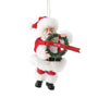 Front view of 2026 Dated Possible Dreams Clothtique Santa Ornament featuring Santa in a faux fur trimmed suit holding a wreath with 2026 ribbon.