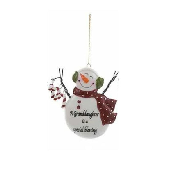 Snowman ornament with red scarf and the words “A Granddaughter is a special blessing.”