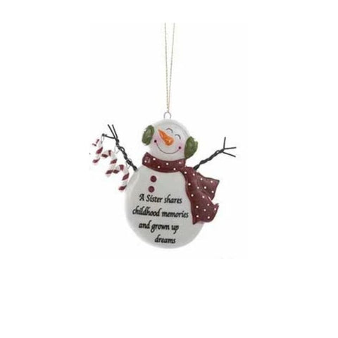 Snowman ornament with red scarf and the words “A Sister shares childhood memories and grown up dreams.”