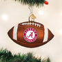 Alabama Crimson Tide football ornament hanging on a Christmas tree.