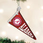 Alabama-themed pennant ornament hanging on a Christmas tree