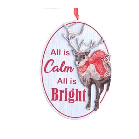 Oval ornament with the words “All is Calm All is Bright” and an illustrated deer wearing a red scarf on a white wood-look background.