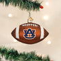 Football-shaped ornament with Auburn logo on a Christmas tree