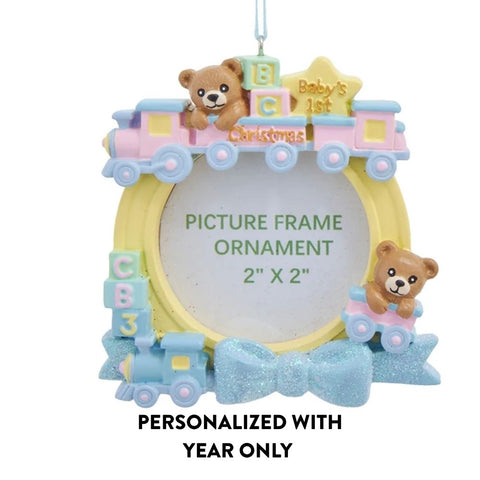 Baby’s first Christmas boy train picture frame ornament shown with personalized with year only text below the image.