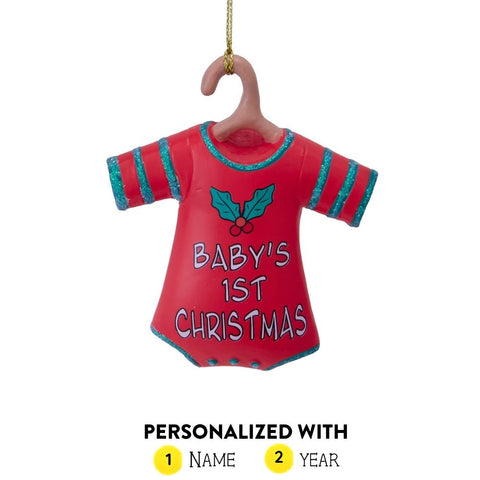Red baby's first Christmas onesie ornament with blue glitter trim, holly detail, and “Baby's 1st Christmas” on the front, personalized with a name and year.
