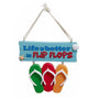 Life Is Better in Flip Flops ornament with a blue beach sign, three colorful flip flops, a starfish, and shell detail.