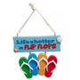 Life Is Better in Flip Flops ornament with a blue beach sign, four colorful flip flops, a starfish, and shell detail.