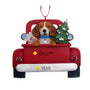 Decorative Christmas Beagle ornament with a dog in a red truck carrying a tree and gift. Can be personalized.
