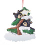 Personalized bear couple ornament with two black bears in a snow-covered evergreen tree and space for two names, a short phrase, and year.
