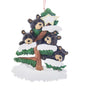 Personalized bear family of 4 ornament with four black bears in a snow-covered evergreen tree and space for four names, a short phrase, and year.