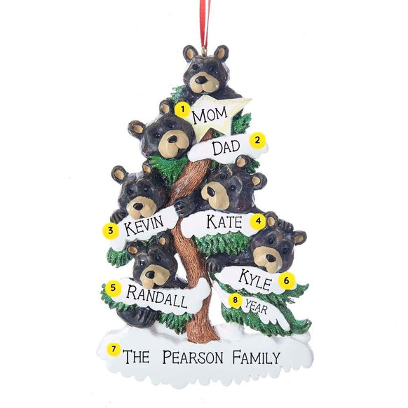 Personalized bear family of 6 ornament with six black bears in a snow-covered evergreen tree and space for six names, a family name, and year. Shown with example personalization.