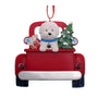 Decorative Christmas ornament with a red truck, Bichon Frise dog, and Christmas tree on a white background.