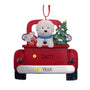 Decorative Christmas ornament with a red truck, Bichon Frise dog, and Christmas tree on a white background.