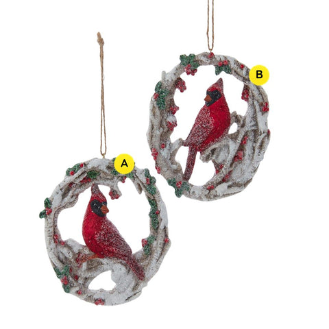 Birch-style wreath ornaments with a red cardinal perched inside, accented with snowy detail, holly leaves, and red berries.