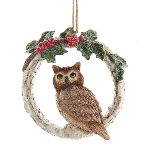 Birch-style wreath ornament with holly leaves and red berries, featuring a brown owl perched inside the ring.