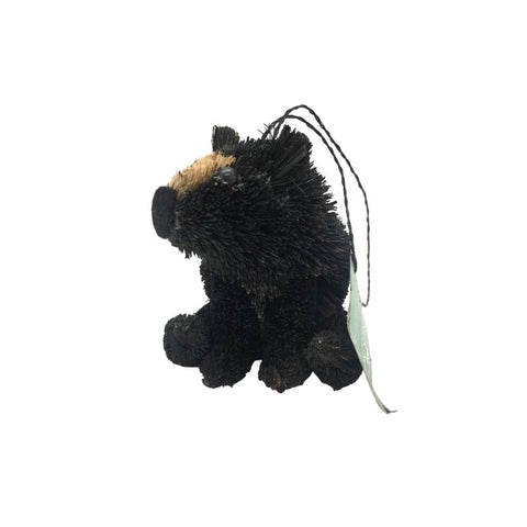 Black bear buri ornament with textured black bristle body, tan muzzle detail, black hanging loop, and rustic woodland style.