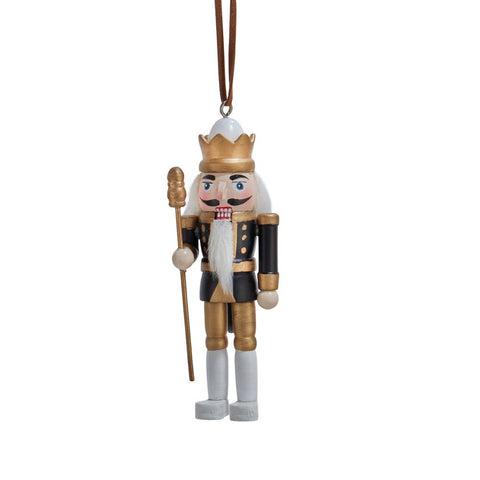 Black, white, and gold nutcracker ornament holding a staff, with a crown, painted details, and a long white beard.