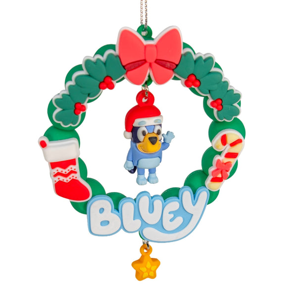 Bluey Christmas Wreath Ornament with Bluey wearing a Santa hat inside a green wreath with holly, bow, stocking, candy cane, and star charm.