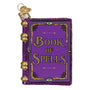 Decorative ornament shaped like a 'Book of Spells' with purple cover and gold accents on a white background.