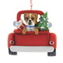 Boxer Dog Christmas ornament in a red truck with a tree and gift.