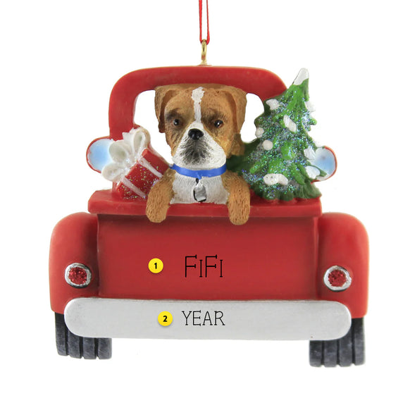 Boxer Dog ornament in a red truck with a Christmas tree and gift, personalized with names and year