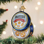 Decorative Christmas ornament resembling a tin of butter cookies on a tree.