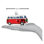 Red and white vintage van ornament with measurement label on a white background