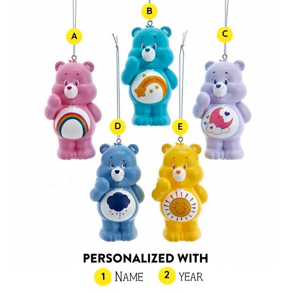 Personalized Care Bears Christmas ornament options labeled A through E, shown with placement for adding a name and year.