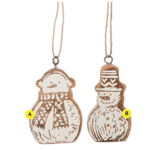 Carved snowman ornaments made from mango wood, featuring two rustic whitewashed designs: one snowman with earmuffs and a scarf, and one snowman wearing a patterned top hat.