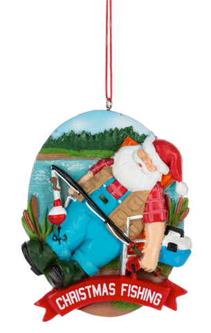 Christmas Fishing Santa ornament featuring Santa in a red plaid shirt and blue waders, holding a fishing rod beside a lakeside scene with cattails, a bobber, tackle box, and “Christmas Fishing” banner.