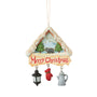 Front view of Jim Shore Christmas at the Lodge Ornament featuring a snowy lodge-shaped design with a bear scene, Merry Christmas message, and dangling winter charms.