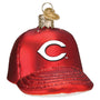 Red glass ornament shaped like a baseball cap with a white 'C' logo on a white background