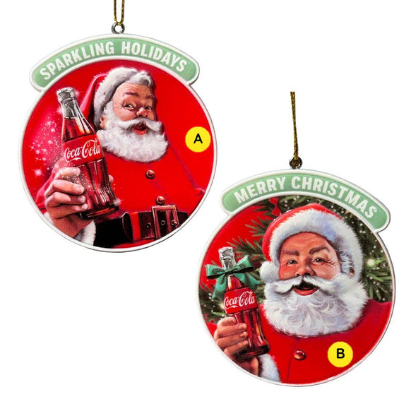 Coca-Cola 3-D Printed Santa Ornaments featuring two round vintage-style Santa designs, each holding a Coca-Cola bottle with holiday wording across the top.