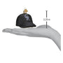 Black cap ornament with a rockies logo on a hand for scale, showing 2.25 inch height.