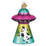 Decorative ornament with a cow inside a UFO on a white background