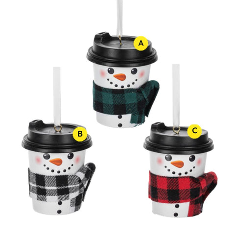 Cup of Cheer snowman ornaments styled like to-go coffee cups with black lids, carrot nose faces, and plaid scarves in green, black, and red