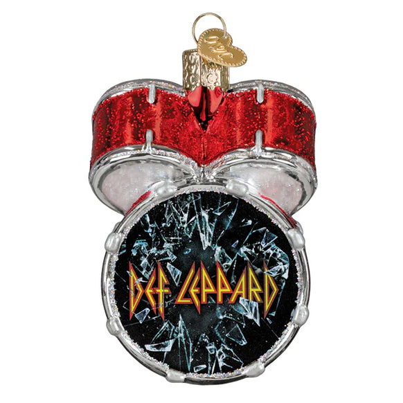 Decorative ornament shaped like a drum set with Def Leppard logo on a white background