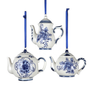 Three Delft blue floral teapot ornaments in tall, round floral medallion, and round floral spray designs.